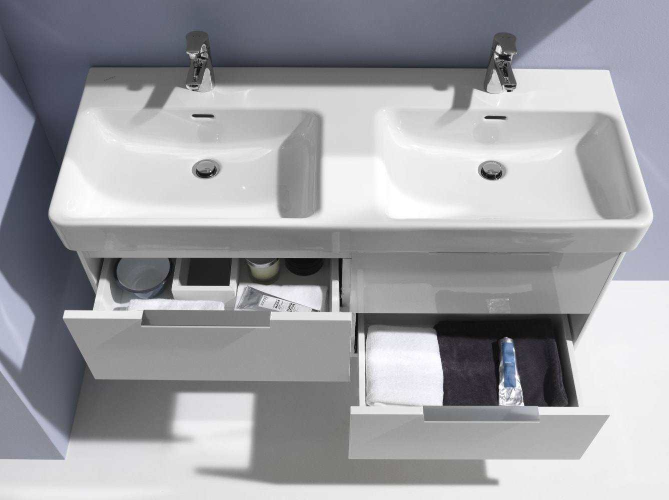 <p><b>Perfect for Shared Spaces</b></p>
<p>If you share your bathroom with a partner or have a bustling household, double basins are a true blessing. Opt for a 1000mm modern basin and vanity unit or if space permits 1200mm double basin and vanity units. No more disputes over sink space or complaints about toothpaste messes. With dual sinks, everyone can enjoy their own dedicated area, fostering harmony and efficiency in your home.<br><br></p>


</p>