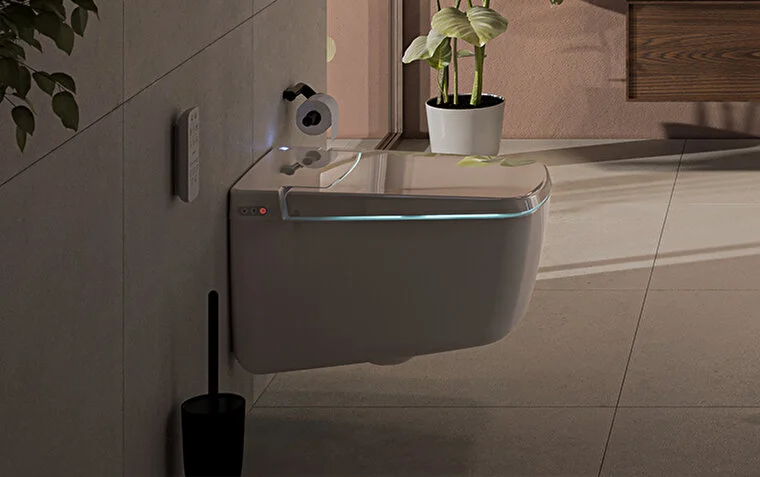 <p><h4>Benefits:</h4></p>
<p><b>Shared Benefits: </b>Both Vitra and Roca smart toilets enhance hygiene and personal comfort. They can potentially reduce toilet paper usage (eco-friendly!), and the warm water and air drying provide a gentle, refreshing clean. The night light on some models is a great night time benefit - especially if you have children!</p>
<p><b>Vitra's Edge: </b>Vitra's focus on additional features like automatic opening/closing lids, warm seats and deodorisers adds a touch of luxury and convenience.
<p><b>Roca's Strength: </b>Roca's focus on core functionalities like cleaning and various install methods plus sleeker design aesthetic makes them a good choice for those seeking a minimalist approach.</p>
<I>(Picture below: Vitra V-Care night light)</I>