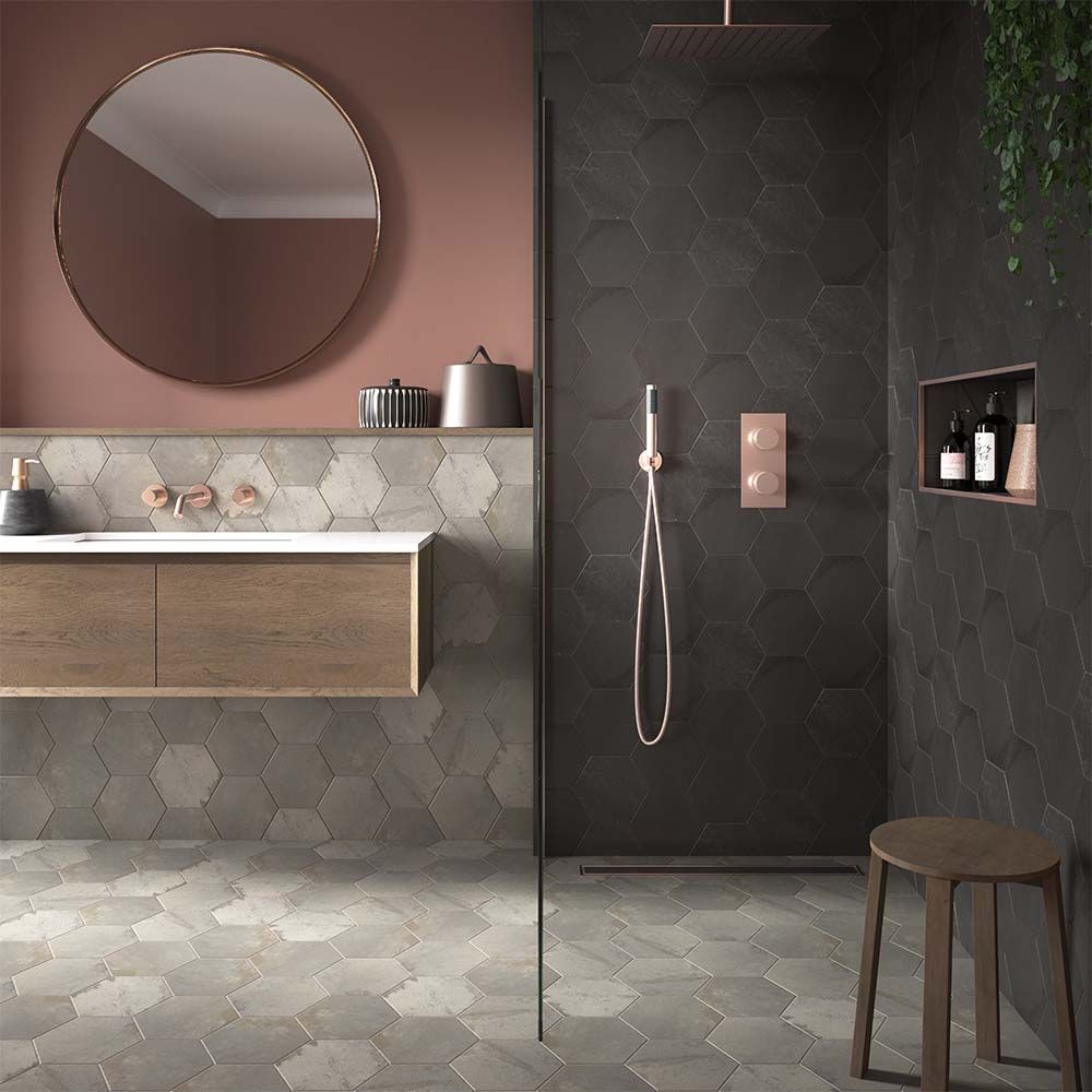 <p><b>CREATE SOME THEATRE </b></p>
<p>If you prefer to have contrasting walls instead of using paint to add colour use a strong dark tile on one wall. Tiles don’t get marked and scuffed like paint will in bathrooms and it also creates a premium look.

<p/>